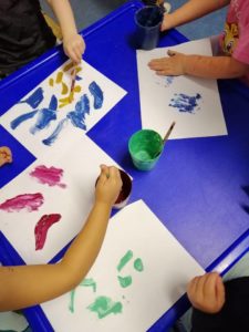 Children painting at Children First Preschool